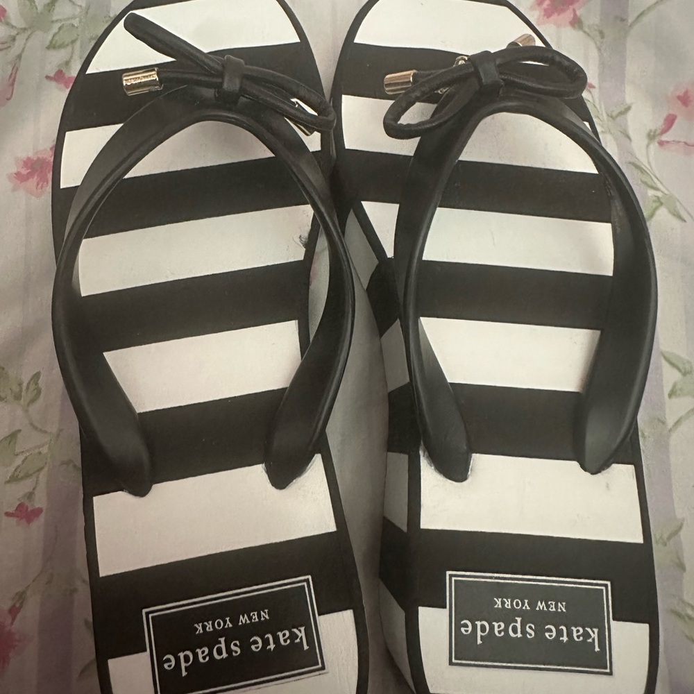 Black and white Kate Spade New York platform sandals